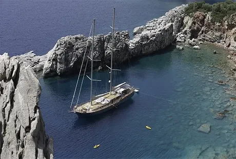 silver moon delux yacht anchored in a bay 